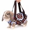 Brown polka dot rabbit carrier harness bag with blue trim, bunny wearing adjustable travel sling with leash attachment