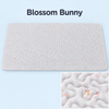 Blossom Bunny quilted rabbit playpen mat with a pale pink bunny and floral pattern.