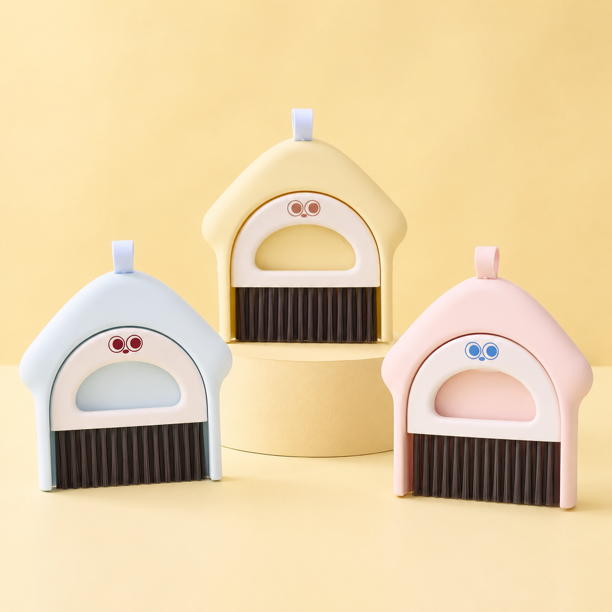 Pink, yellow, and blue rabbit cage cleaning brush and dustpan sets
