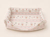 Foldable fabric rabbit hay box in the Pink Bow bunny print.