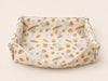 Foldable fabric rabbit hay box in the Bread Rabbit print.