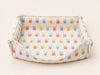 Foldable fabric rabbit hay box in the Colorful Rabbit print.